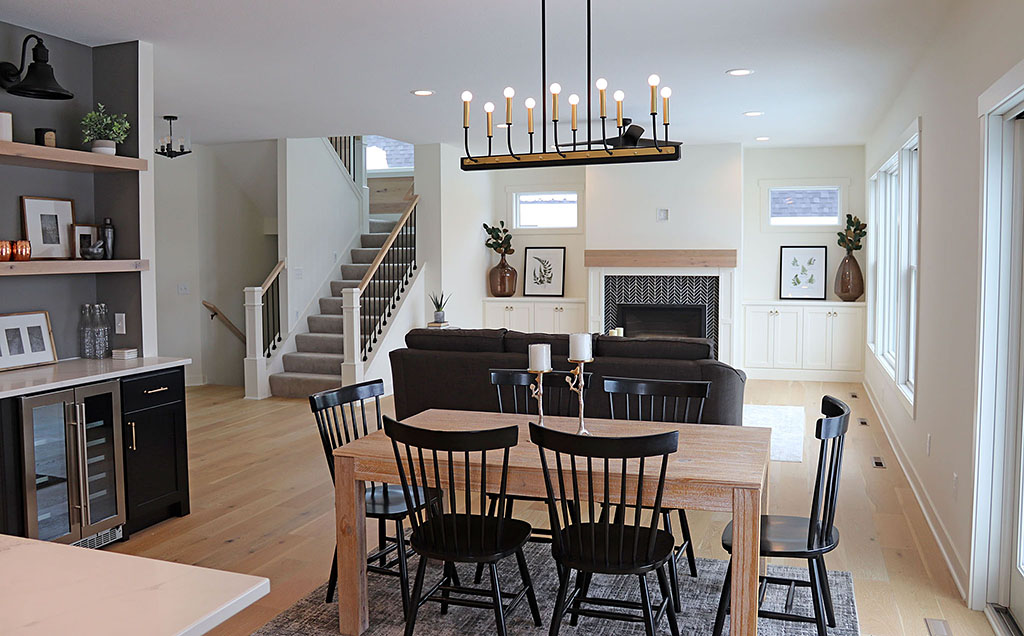 Bright, contemporary open floor plan with dining room, living room and bar nook area