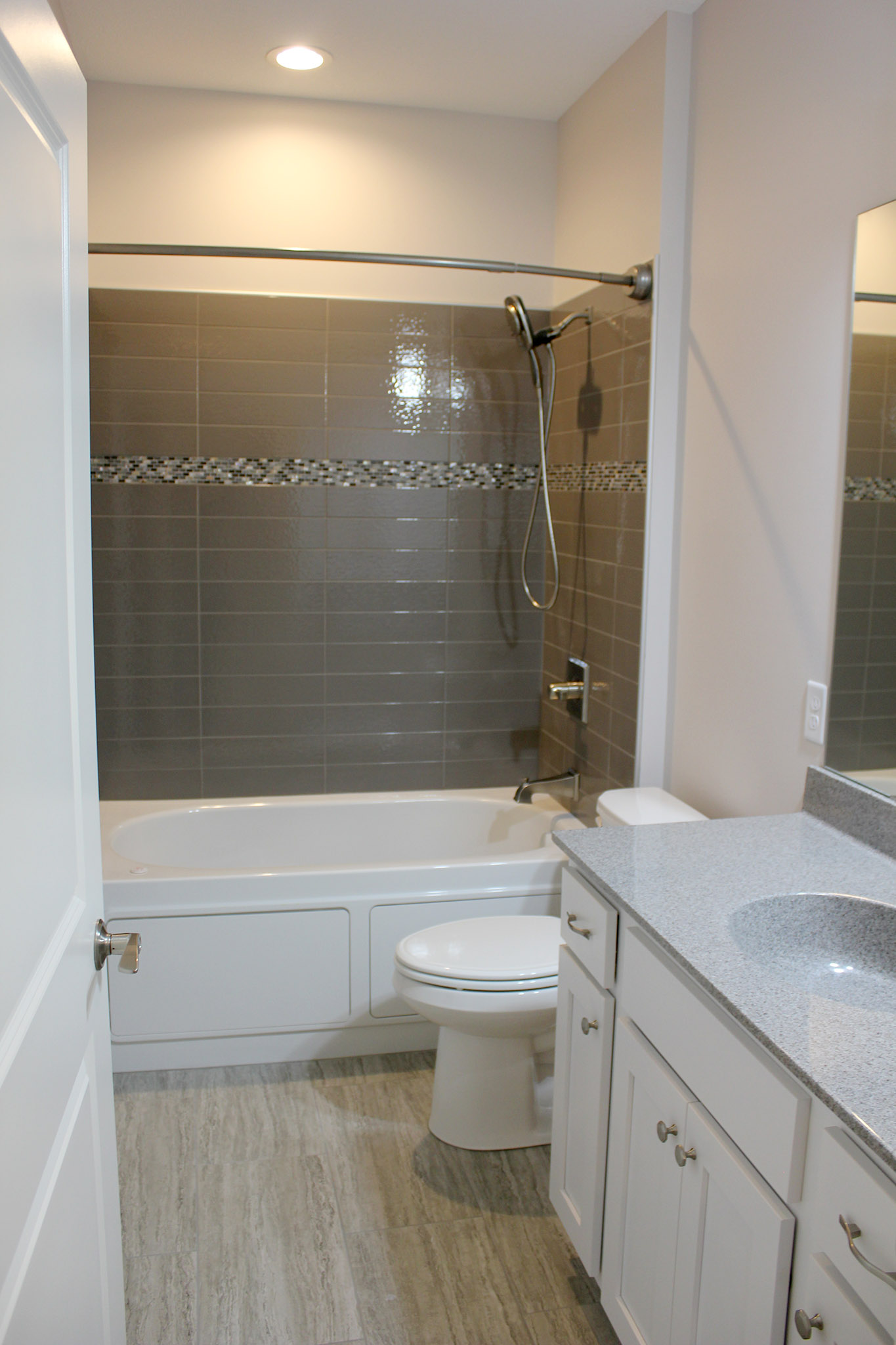 Bathroom with tile floor and shower